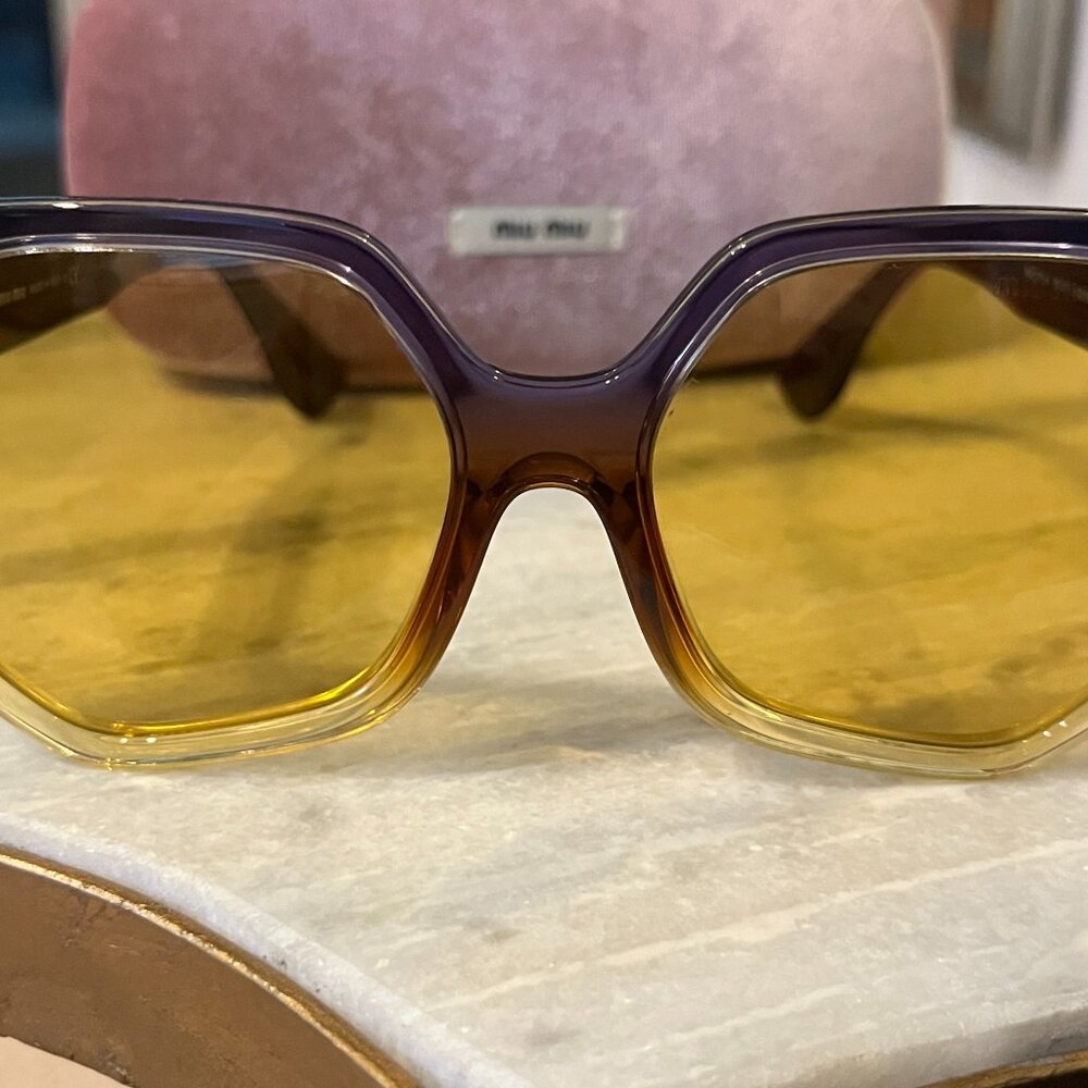 Miu Miu Sunglasses. never worn, new with tag.